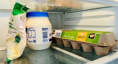 It is best practice to keep eggs in their cardboard carton inside the fridge.