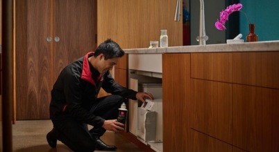 A Zip HydroTap unit being serviced by a Zip technician