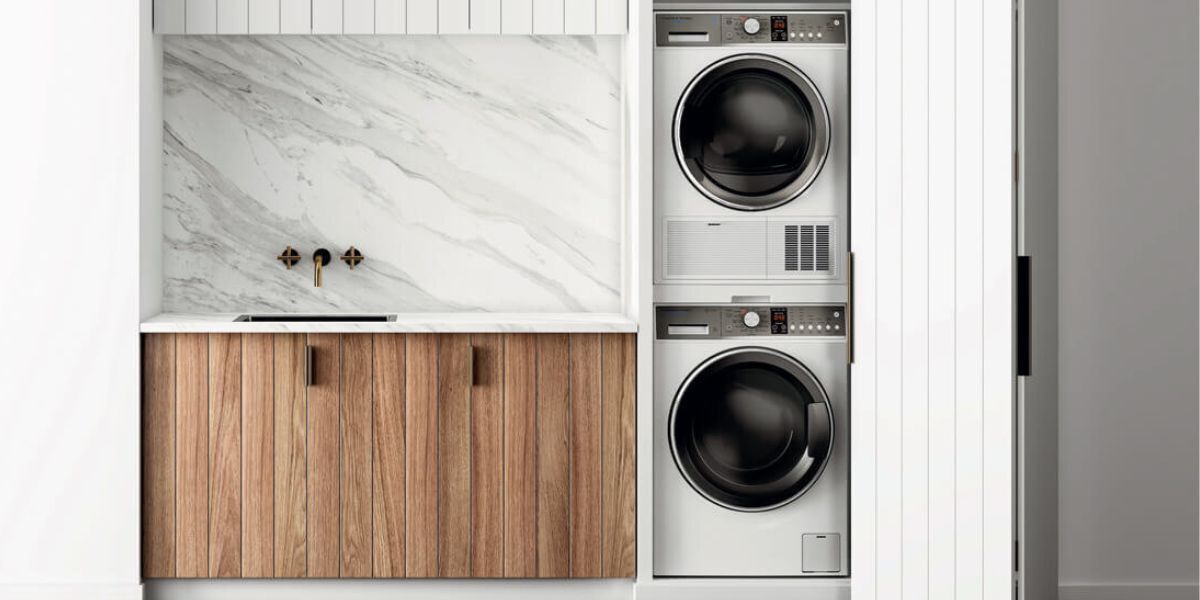 A stacked Fisher & Paykel brand washing machine and dishwasher.